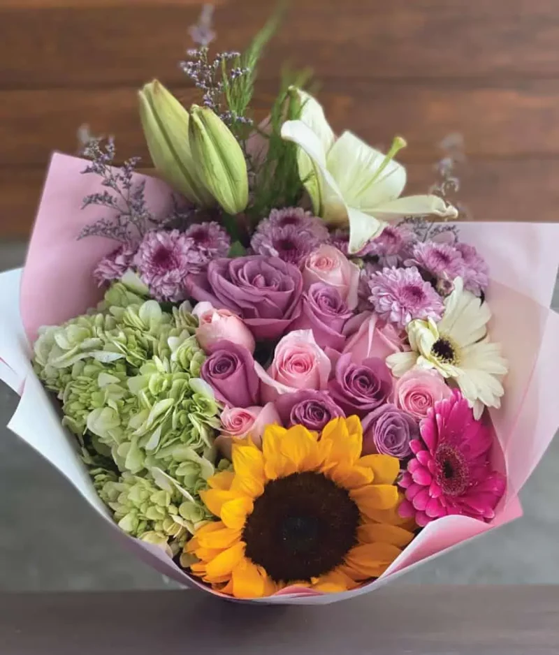 Ramo amor constante de rosas, girasol y gerberas, florería en Puebla, entrega de flores a domicilio el mismo día