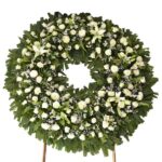Corona de flores Condolencias, Florerías en Puebla, entrega de coronas fúnebres en Puebla