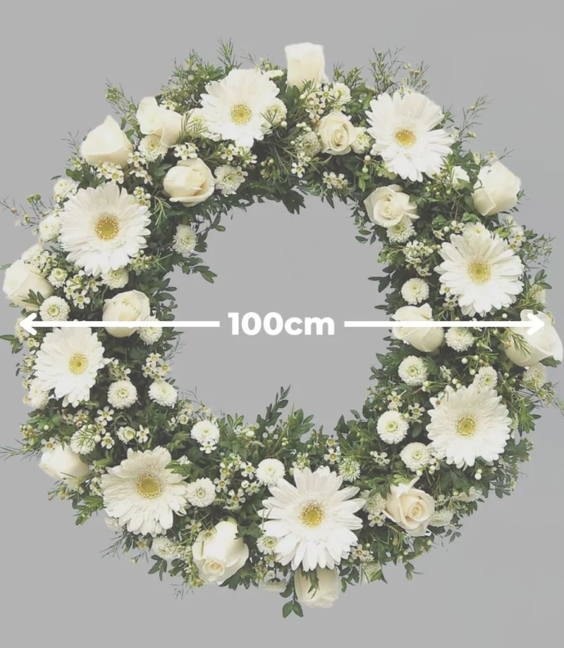 Corona-funebre-de-100cm.webp Corona de flores blancas de Florerias en Queretaro, flores a domicilio en Queretaro