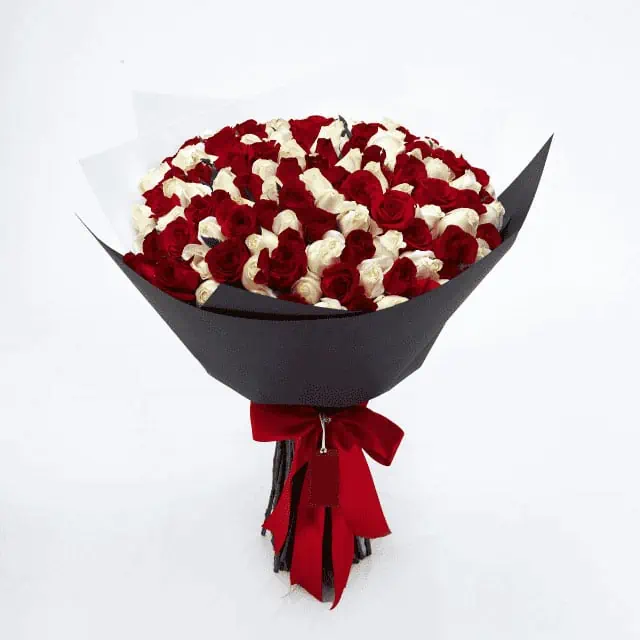 ramo buchon rosas rojas con chocolates