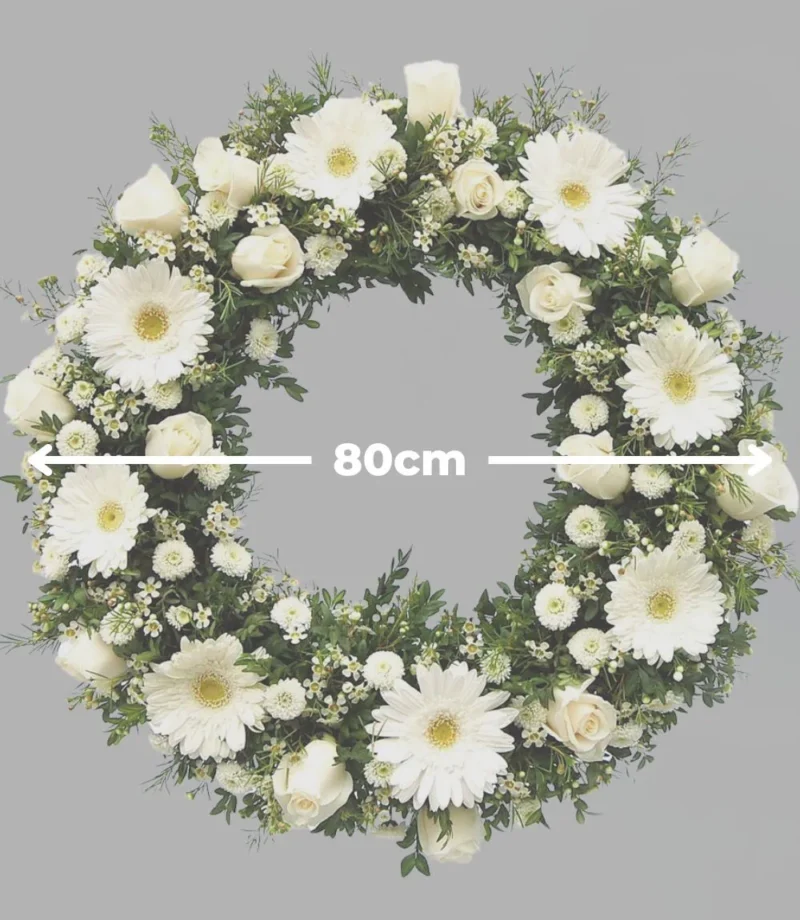 Corona-funebre-de-80cm.webp Medida corona fúnebre "Paz y serenidad", Florerías en Pachuca, entrega de coronas de flores a domicilio en Pachuca